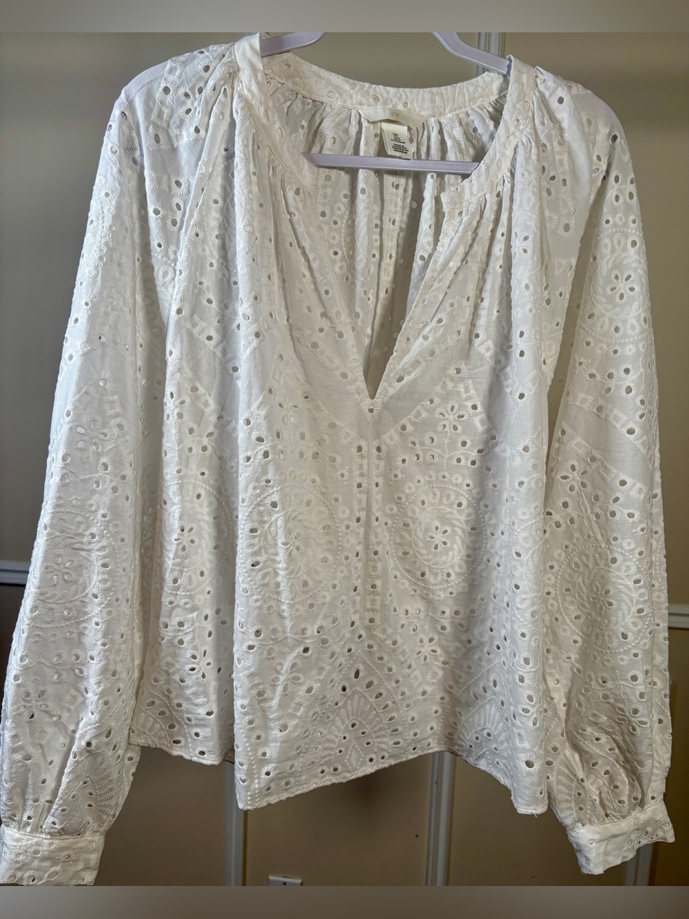 White Broderie Anglaise Blouse Featuring Eyelet Embroidery & Relaxed V-neckline